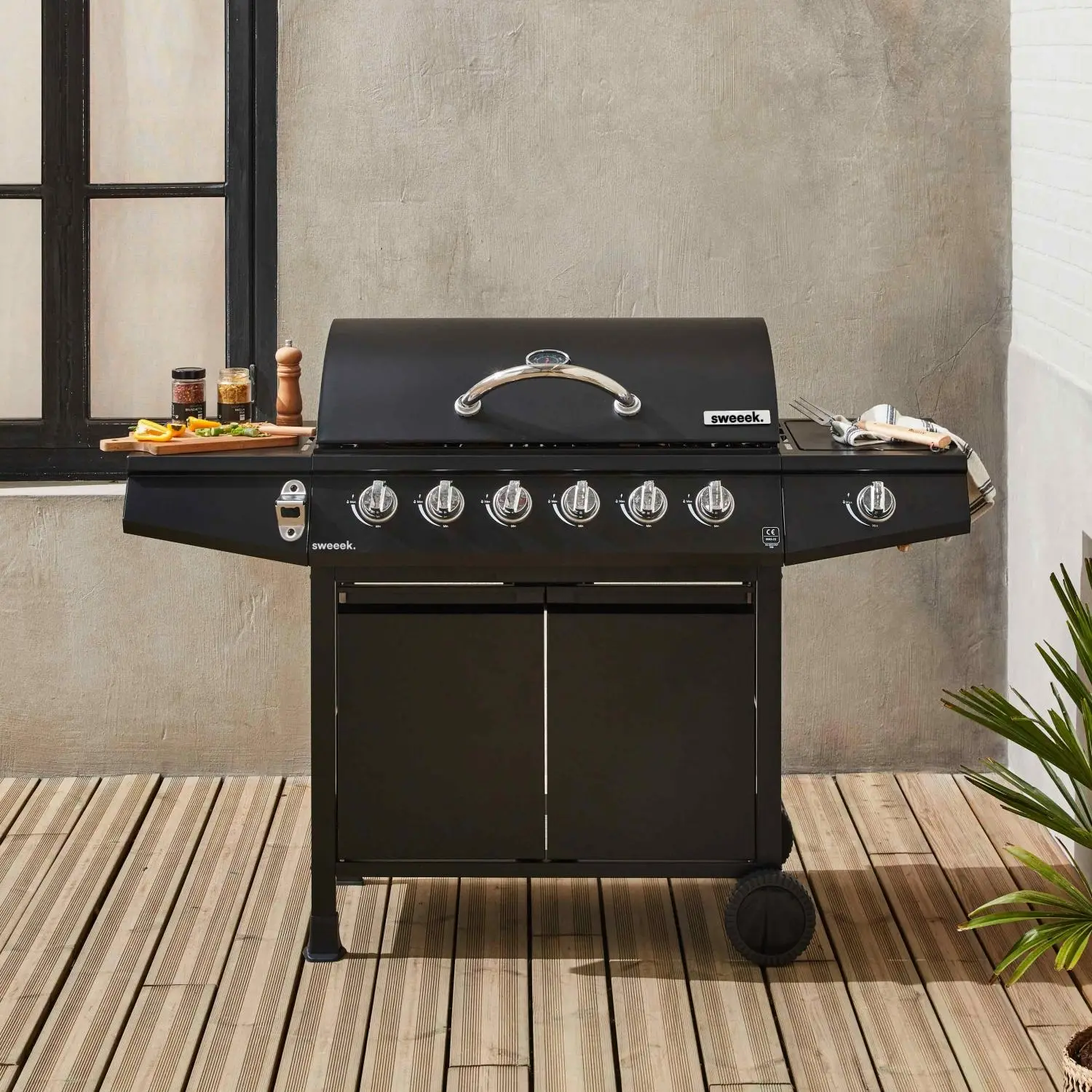 Barbecue gaz 6 brûleurs + 1 feu latéral avec roues, tablettes et thermomètre