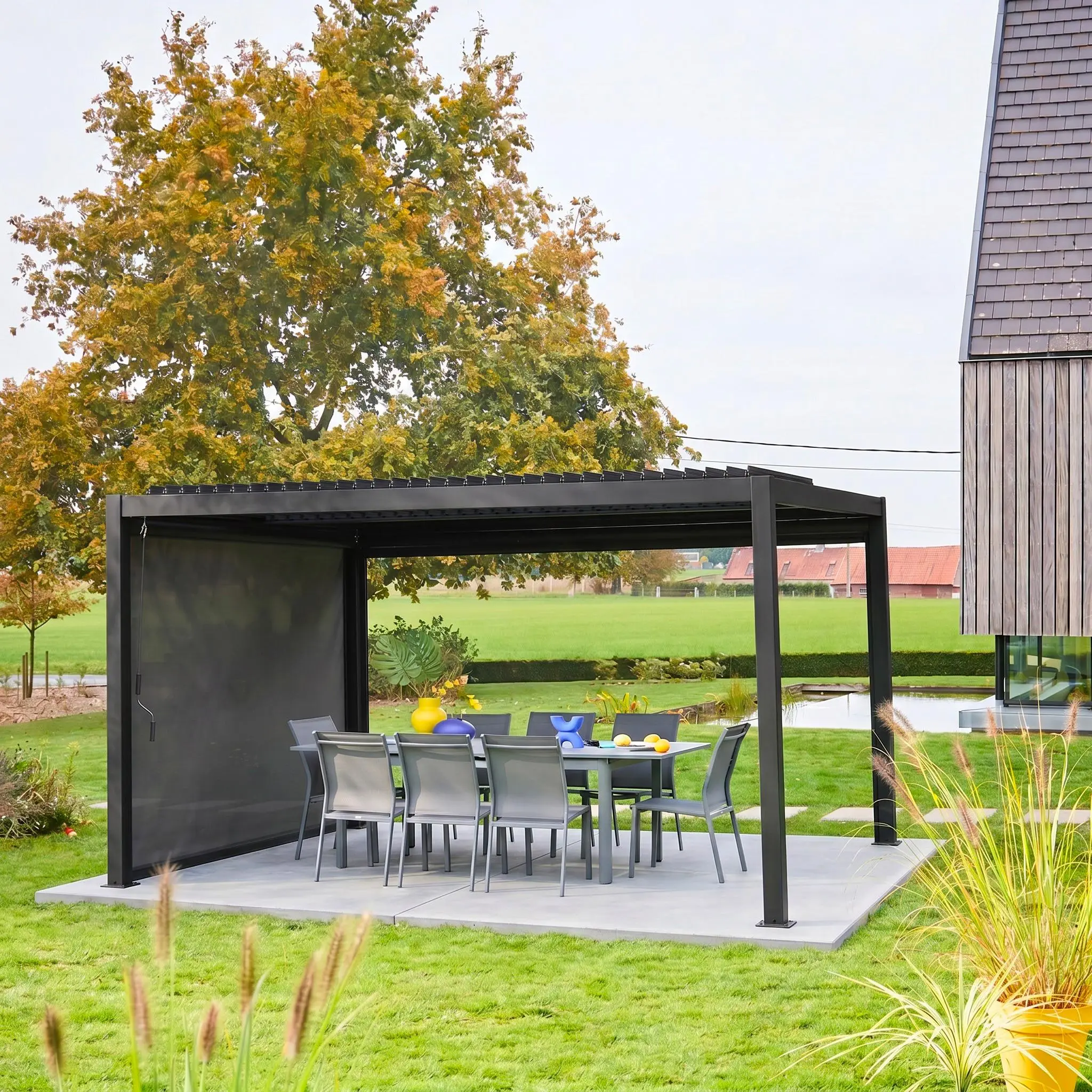Pergola bioclimatique aluminium et acier 4x3m + 1 store 3m Palace