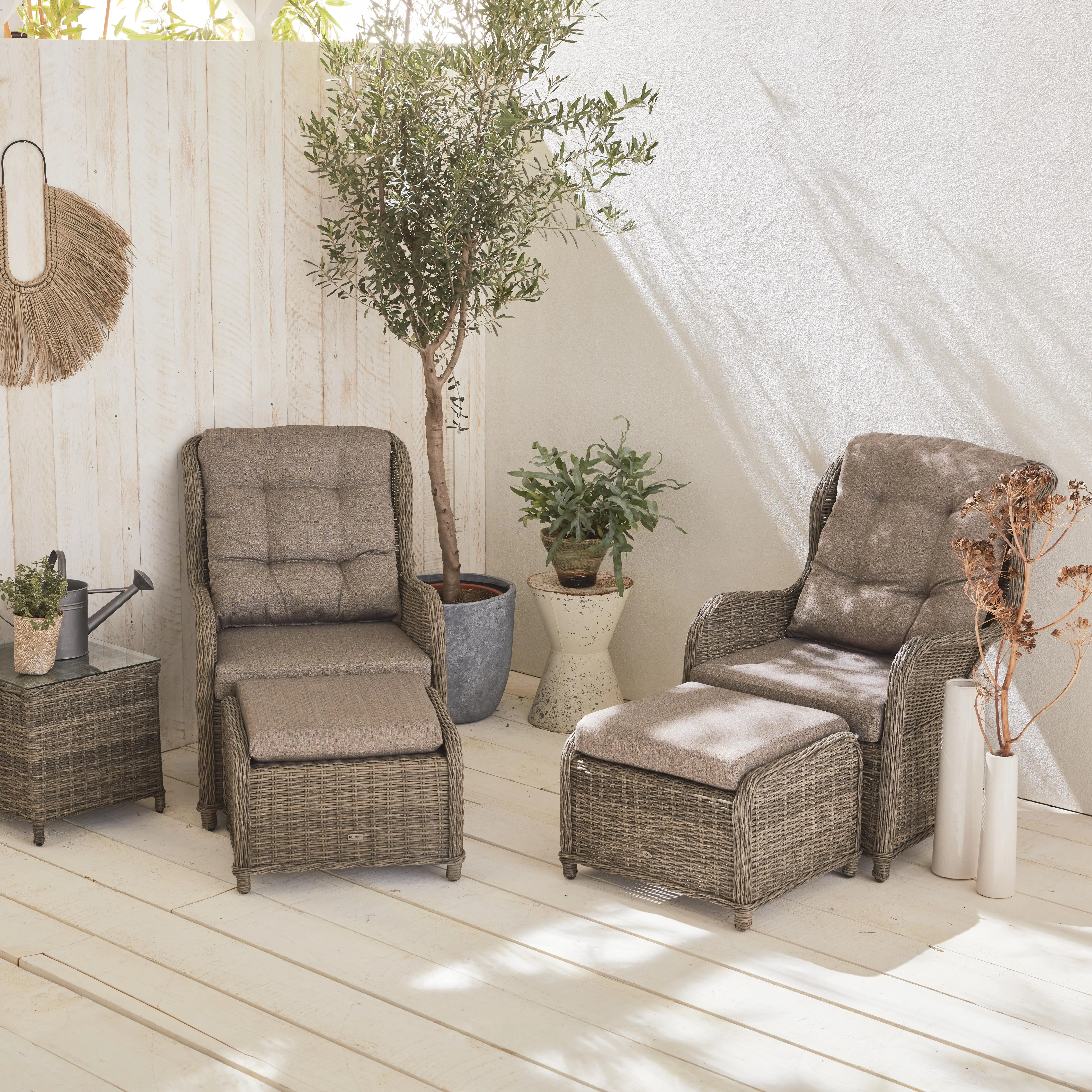 Fauteuil de jardin + repose pieds résine tressée ronde (lot de 2)
